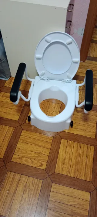 Elevador WC con reposabrazos