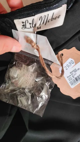 Elegante top M. con lazada frontal