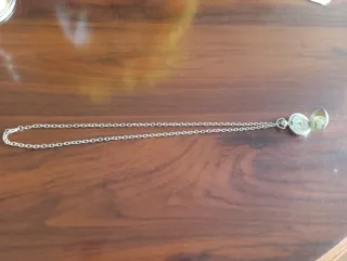 Reloj colgante plateado