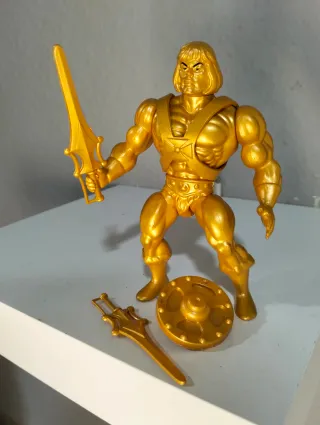 Figura He-Man Masters del Universo Dorada