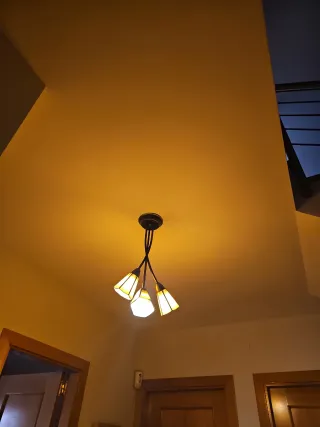 Lampada a sospensione in vetro e metallo