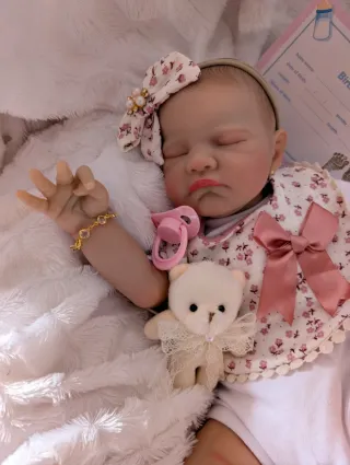 Reborn la cabecita  va hacia atrás como un bebé