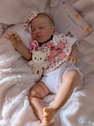 Reborn la cabecita  va hacia atrás como un bebé