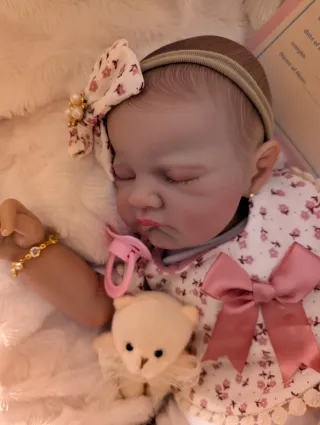 Reborn la cabecita  va hacia atrás como un bebé