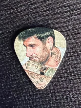 Púa de guitarra Melendi