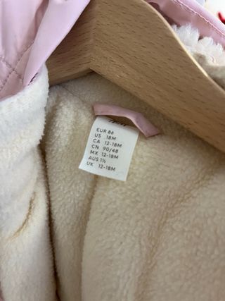 Mono de nieve rosa para bebé