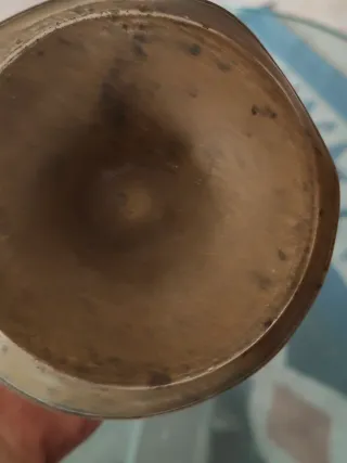 Antica lampada ad olio in rame