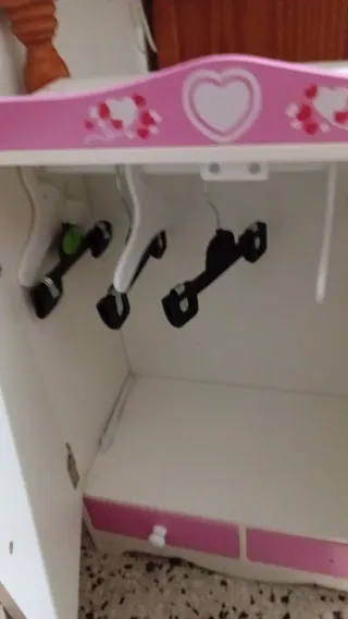 Carrito de bebé rosa sin muñeca