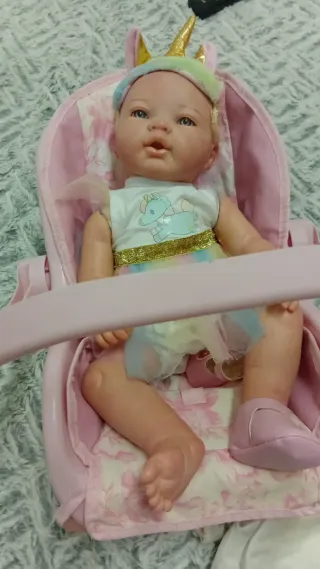Carrito de bebé rosa sin muñeca