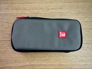 Nintendo Switch Lite Amarilla + Funda