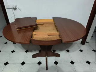 Mesa de comedor redonda de madera extensible