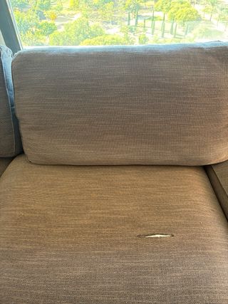 Sofá modular gris en forma de U