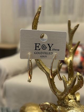 Pendientes largos dorados y plateados con brillant