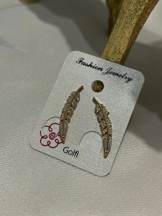 Pendientes largos dorados y plateados con brillant