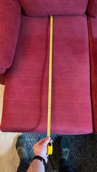 Sofá 2 plazas granate extensible.