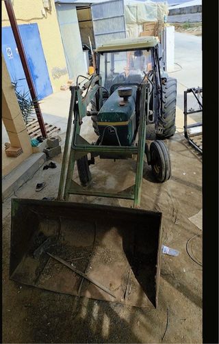 Tractor John Deere con pala