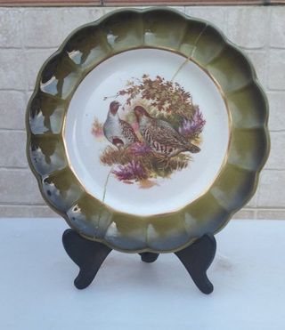 Plato decorativo porcelana aves dorado