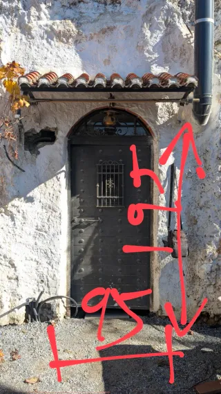 Puerta de hierro forjado