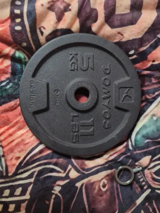 Discos de pesa 5 kg (11 lbs) DOMYOS