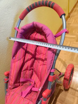 Silla de paseo para muñecas rosa de 3 ruedas plega