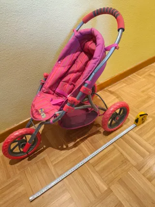 Silla de paseo para muñecas rosa de 3 ruedas plega