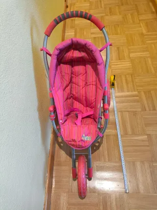 Silla de paseo para muñecas rosa de 3 ruedas plega