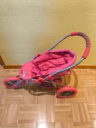 Silla de paseo para muñecas rosa de 3 ruedas plega
