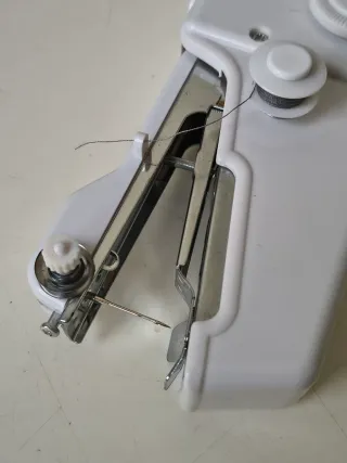 Máquina de coser portatil