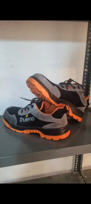 Zapatillas de seguridad Trueno negras y naranjas
