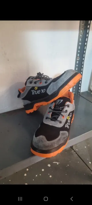 Zapatillas de seguridad Trueno negras y naranjas