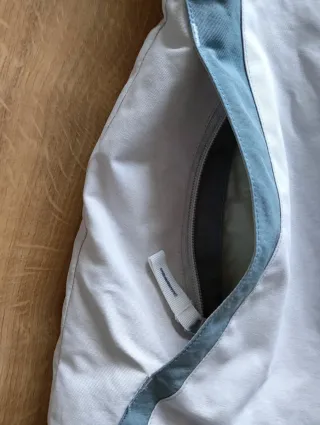 Chaqueta Quechua impermeable azul y gris claro