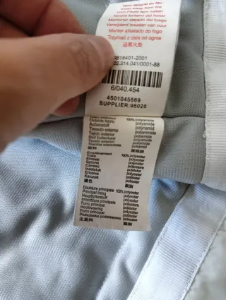 Chaqueta Quechua impermeable azul y gris claro