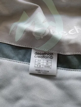 Chaqueta Quechua impermeable azul y gris claro