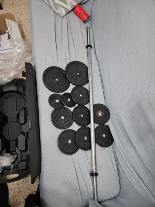 Banco de pesas y discos