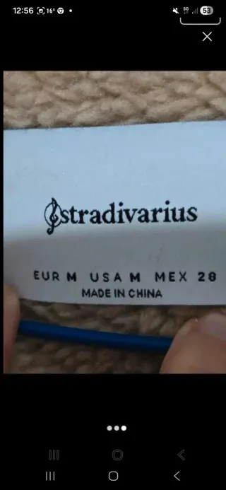 Chaleco doble faz negro y beige