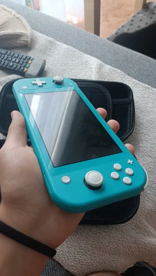 PACK Nintendo Switch Lite + 5 Juegos