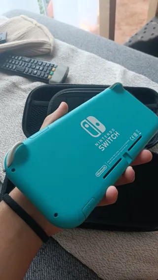 PACK Nintendo Switch Lite + 5 Juegos