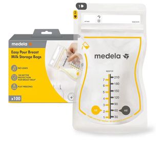 Sacaleches Medela Swing Maxi con bolsas y Purelan