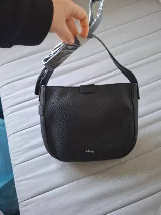 Bolso bandolera ecopiel asa anillas metálicas
