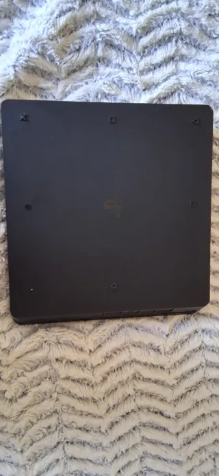 Consola PS4 Slim 1TB + 5 Juegos