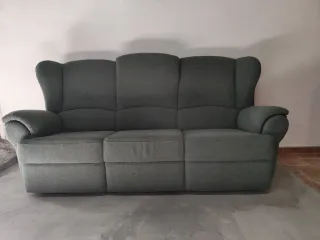 Sofá verde de tela poco uso