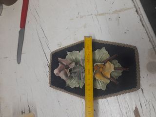 Decorazione floreale in ceramica