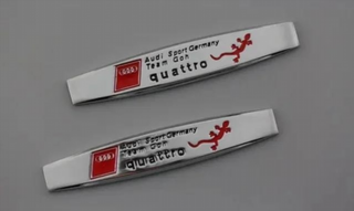 2 EMBLEMAS LOGO CROMADO AUDI SLINE LAGARTO e_791