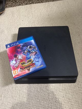 PS4 Slim Negra + Street Fighter V Champion Edition
