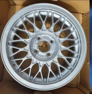 4 Llantas BBS 15" mas tapas Golf G60