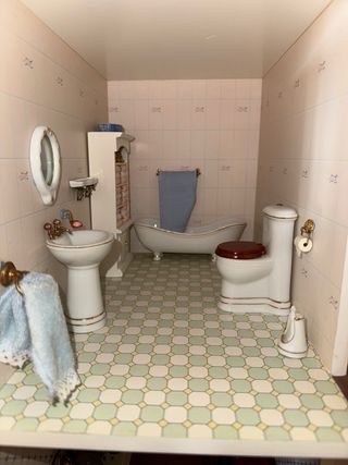 Casa de muñecas de madera