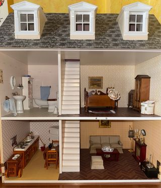 Casa de muñecas de madera