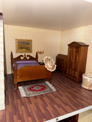 Casa de muñecas de madera