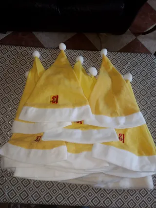 20 Bolsas de cotillón y 20 Gorros de Papa Noel