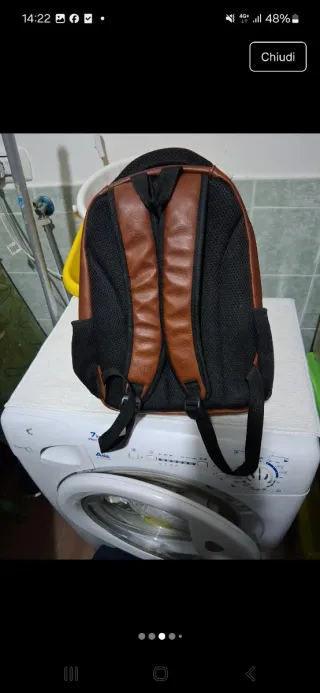 Zaino tracolla con zip